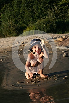 Boy playing at beach