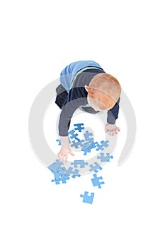 Boy playing blank puzzle game