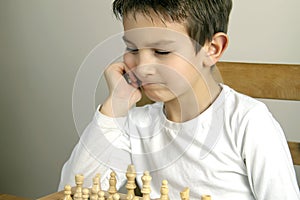 Boy playing chess