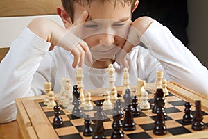 Boy playing chess