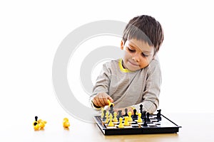 Boy playing chess