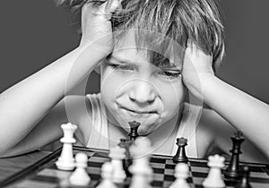 Boy playing chess