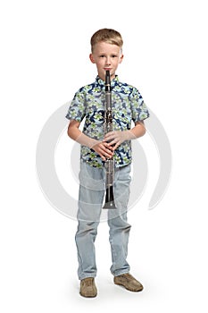 Boy playing a clarinet