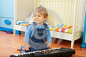 Boy playing a composer photo