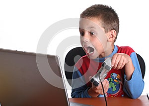 Boy playing computer games