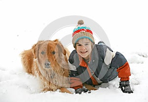 Boy Playing with Dog in Snow