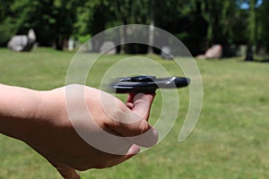 Boy playing with fidget spinner toy