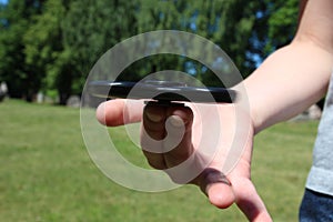 Boy playing with fidget spinner toy