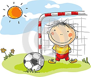 Boy playing football as a goalkeeper