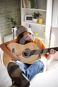 Boy playing guitar