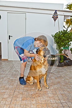 Boy playing with his dog