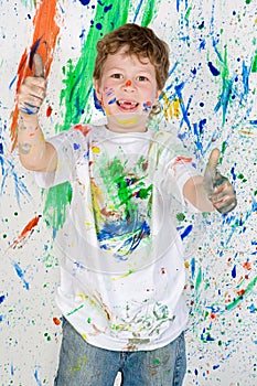 Boy playing with painting