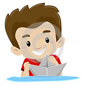 Boy playing Paper Boat in the water