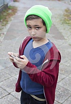 Boy playing on phone