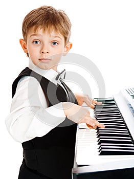 Boy playing piano