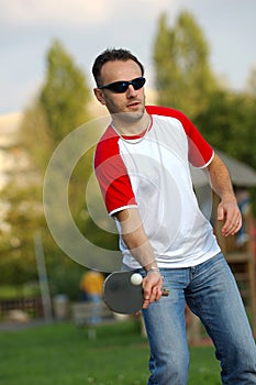 Boy playing ping pong