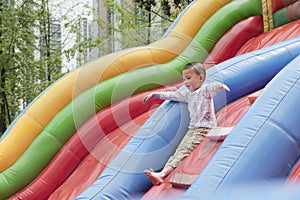 Boy slide on playground