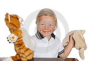 Boy playing puppet show