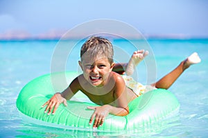 Boy playing in the sea