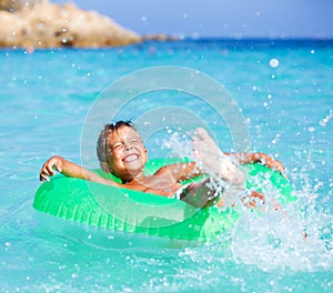 Boy playing in the sea