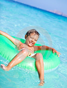 Boy playing in the sea