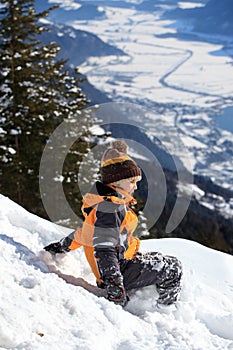 Boy playing in snow