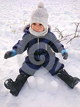 Boy playing in the snow