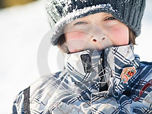 Boy playing in the snow