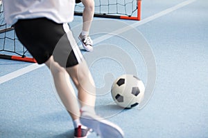 Boy playing soccer