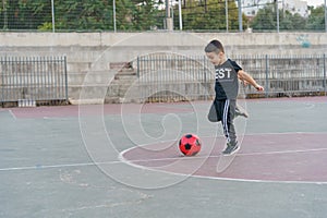 Boy Playing Soccer.