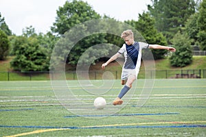 Boy Playing Soccer - Kicking the ball