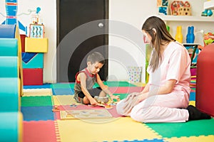 Boy playing in a therapy center