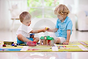 Boy playing toy cars. Kid with toys. Child and car