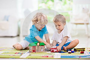 Boy playing toy cars. Kid with toys. Child and car