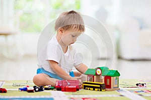 Boy playing toy cars. Kid with toys. Child and car