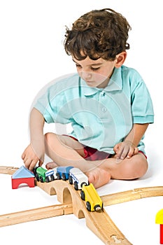 Boy playing with train