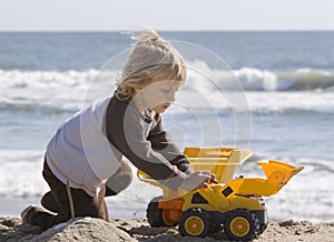 Boy playing with trucks