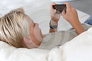 Boy playing with video game