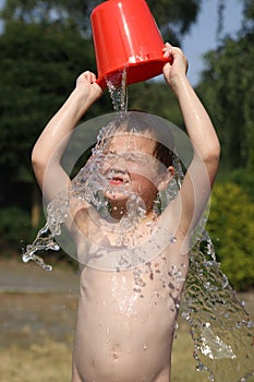 Boy playing with water