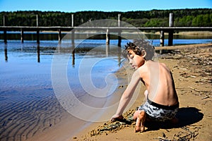 Boy playing in the water