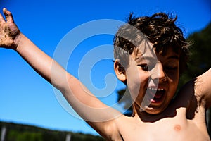 Boy playing in the water