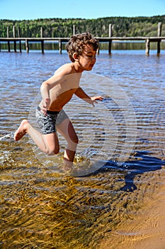 Boy playing in the water