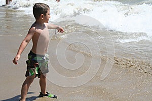 Boy Playing in Water