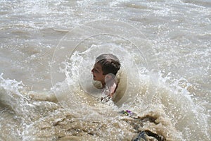 Boy Playing in Water