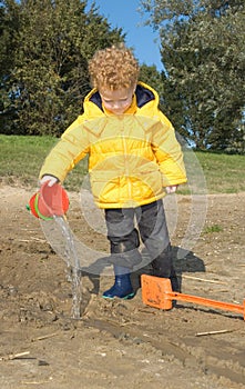 Boy playing with Water