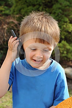 Boy playing with wireless station
