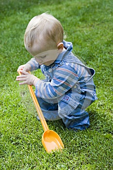 Boy playing in yard