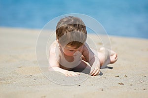 Boy plays on beach