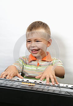 Boy plays piano