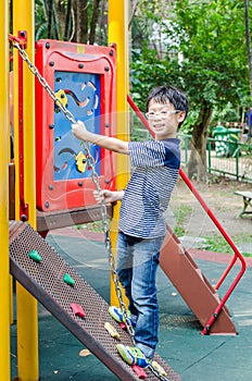 Boy plying in playground